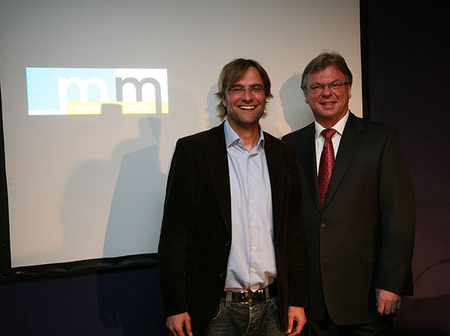 Jürgen Klopp, langjähriger Trainer des BVB und m+m Geschäftsführer Michael Müller auf einer m+m Firmenveranstaltung.